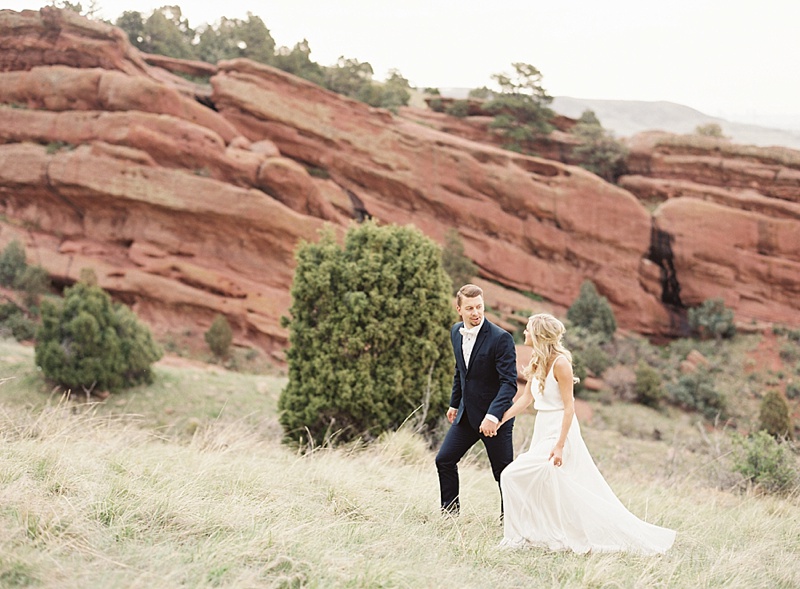 Denver red rocks vow renewal featured on Style Me Pretty / photography by Emily Jane / florals & styling by Kaitlin Parisho Designs / calligraphy by Paper & Honey
