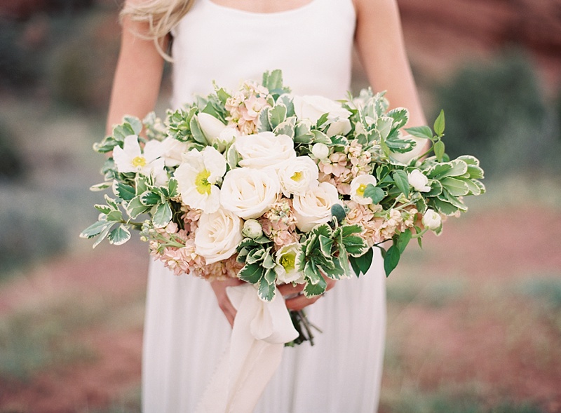 Denver red rocks vow renewal featured on Style Me Pretty / photography by Emily Jane / florals & styling by Kaitlin Parisho Designs / calligraphy by Paper & Honey