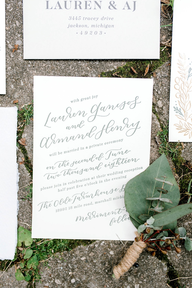 Organic, modern, and romantic gold foil, letterpress and greenery wedding invitation suite / custom wedding invites and stationery / vellum wrap overlay with wax seal and illustration of Jackson Square gates in New Orleans / outdoor summer wedding at The Olde Farmhouse, Marshall Michigan / by Paper & Honey®, www.paperandhoney.com / photos by Chelsea Lusk / https://wp.me/p9foEq-1aA